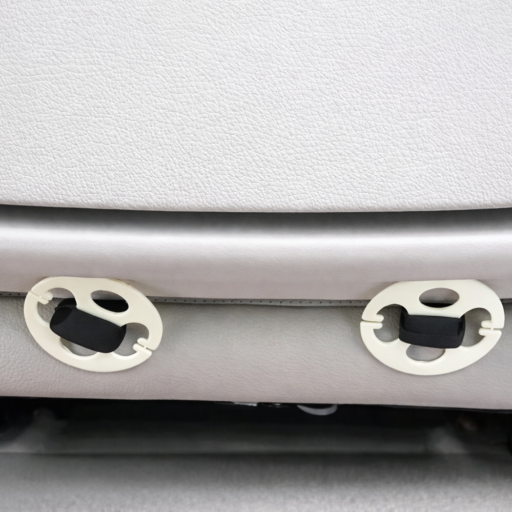 Fixation sous le siège pour protection d’assise auto