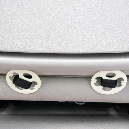 Fixation sous le siège pour protection d’assise auto