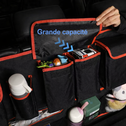 Organisateur de coffre auto suspendu noir et rouge montrant l’ouverture des poches et la capacité de rangement