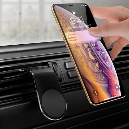 support téléphone magnétique fixé sur grille d’aération voiture