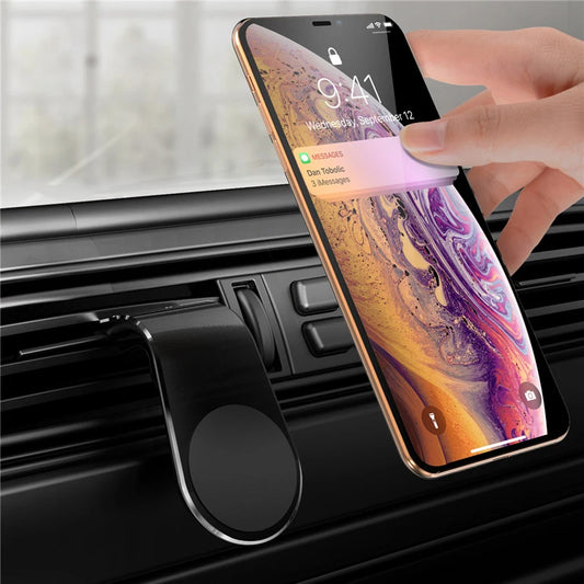 support téléphone magnétique fixé sur grille d’aération voiture